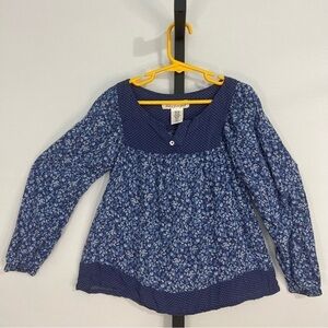 Label of graded goods floral shirt size 7-8